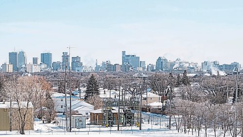Daniel Crump / Winnipeg Free Press. The Winnipeg skyline seen from Westview Park on Saturday afternoon as the temperature sits in the high minus-twenties before windchill.  If Sunday temperatures remain below -20C Winnipeg will records its longest cold snap in a quarter century. February 13, 2021.