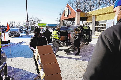 Courtesy of Ma Mawi
More than a hundred volunteers answered that call Saturday morning for the 20th annual Christmas hamper drive from Ma Mawi Wi Chi Itata Centre, packing up and dropping off 200 hampers for Winnipeg families in need. Dec. 18, 2021. For Katie May story. Winnipeg Free Press.