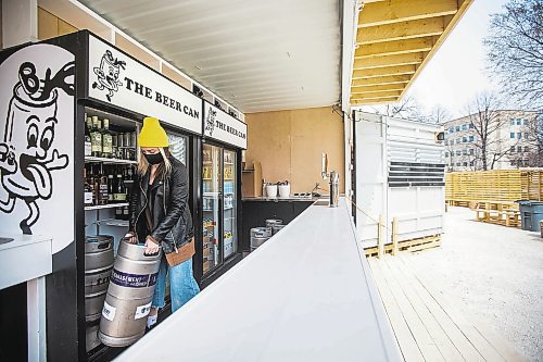 MIKAELA MACKENZIE / WINNIPEG FREE PRESS

Laura Cameron stocks the fridge at the Beer Can by the Granite Curling Club, which will be opening tomorrow, in Winnipeg on Friday, April 30, 2021. Standup.
Winnipeg Free Press 2020.