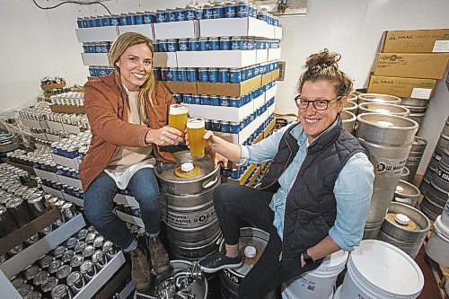 MIKE DEAL / WINNIPEG FREE PRESS
Good Neighbour Brewing co-owners (from left) Amber Sarraillon and Morgan Wielgosz, who is also the brew master, are currently brewing out of Oxus Brewing Co&#x2019;s facility (1180 Sanford Street) until they can find their own space.
210428 - Wednesday, April 28, 2021.