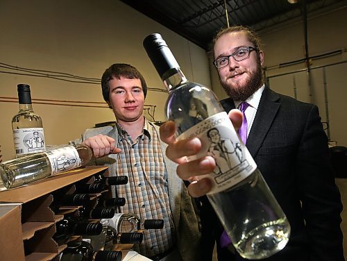 PHIL HOSSACK / WINNIPEG FREE PRESS -  Zach Isaacs (left) and his partner Willows Christopher are a couple of 20 year-olds who have started a home-made wine delivery company &#x2013; selling high octane wine ($9.99) with home delivey. See Martin Cash story.  (the wine is clear because it's made without fruit (grapes) just a sugar solution and &quot;special&quot; yeast that p[roduces 20% alcohol content.)  ....January 23, 2017