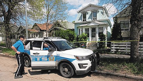 PHIL HOSSACK / WINNIPEG FREE PRESS -A pair of City Cadets guard the scene of a weekend murder at #491 Simcoe Street Saturday. See Melissa Martin Story.  - May 25, 2019.