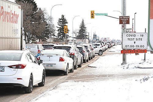 RUTH BONNEVILLE / WINNIPEG FREE PRESS

 

Local - Nairn COVID lineups



Vehicles wait in long line that starts on Nairn Ave. to Thomas Ave. and Keenleyside Street to get into Nairn's, Drive-in COVID testing site Wednesday.  



Dec 22nd,  2021