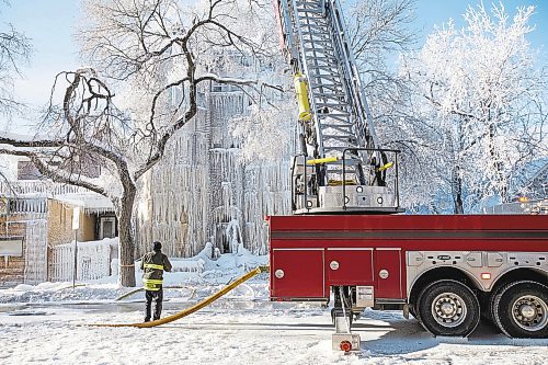 Daniel Crump / Winnipeg Free Press. Firefighters work to put out a fire that broke out New Years Eve. The blaze destroyed an apartment building near Sherbrook Street and Ellice Avenue. January 1, 2022.