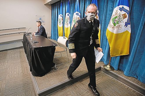 JOHN WOODS / WINNIPEG FREE PRESS

Chief John Lane, Winnipeg Fire and Paramedic Service (WFPS) leaves after speaking to media to address reports of racism within the WFPS in Winnipeg Wednesday, February 3, 2021. 



Reporter: ?