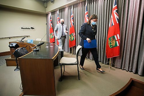 JOHN WOODS / WINNIPEG FREE PRESS
Dr. Brent Roussin (left), Manitoba's chief public health officer, and premier Heather Stefanson leave the province's Dec. 27, 2021 COVID-19 update at the Manitoba legislature.