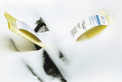 One of thousands of parking tickets- This one on Leo Novak St- the City Of Winnipeg wrote during this weekends residential parking ban&#x2013;Standup Photo- Feb 17, 2015   (JOE BRYKSA / WINNIPEG FREE PRESS)