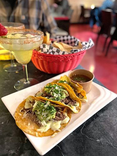 Photos by Shel Zolkewich / Winnipeg Free Press
Try the birria tacos that come with a side of spicy, soupy dipping sauce. And a margarita is highly recommended.