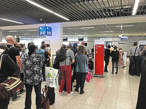 Ron Pradinuk/Winnipeg Free Press                 
Patience over long lineups at airports and being kept on hold when making travel related calls will be required over the coming months.