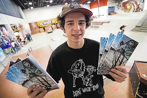 Daniel Crump / Winnipeg Free Press. Jackson Toone, creator of the Don&#x2019;t Waste Time skateboarding zine, holds up holds up copies of the zine&#x2019;s latest issue, issue #5, prior to the launch party at The Edge Skatepark in downtown Winnipeg on Saturday. December 11, 2021.