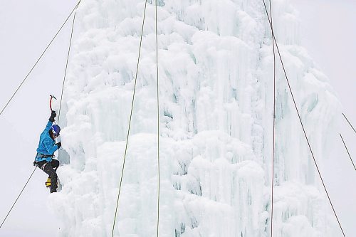 Daniel Crump / Winnipeg Free Press. Stan Mullen climbs the ice climbing tower in St. Boniface, Saturday morning. The tower opened to members earlier this week. January 8, 2022.
