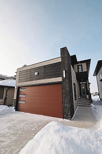 Todd Lewys / Winnipeg Free Press
Cleverly crafted from top to bottom, the 1,647-sq.-ft. Crestmont II is big on livability despite possessing a smaller than normal footprint.