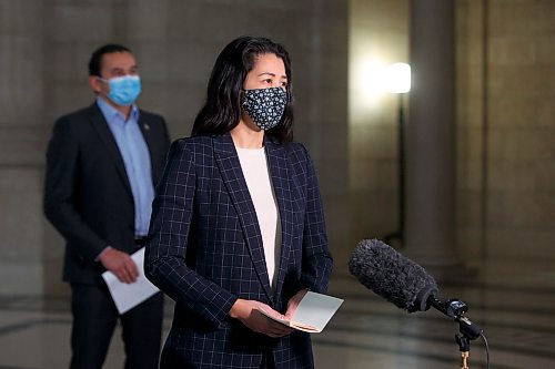 MIKE DEAL / WINNIPEG FREE PRESS

Wab Kinew (left), Leader of the Manitoba NDP, Malaya Marcelino (speaking), MLA for Notre Dame and Critic for Status of Women, and Adrien Sala, MLA for St. James, during a press conference in the Rotunda at the Manitoba Legislative building Friday morning.

See Carol Sanders story

220114 - Friday, January 14, 2022.