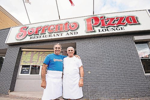 MIKE SUDOMA / Winnipeg Free Press

Gerry Lomonaco  (left) owner of the Sorrentos location on Ellice Ave, and brother, Alfonso Lomonaco (right) stand in front of the Ellice Avenue location Friday afternoon

September 24, 2021