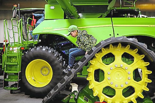 Brandon Sun 23012020

Five-year-old George Van Eaton of Maryfield, Saskatchewan climbs on a towering John Deere tread while visiting Manitoba Ag Days at the Keystone Centre with his dad on Thursday. (Tim Smith/The Brandon Sun)