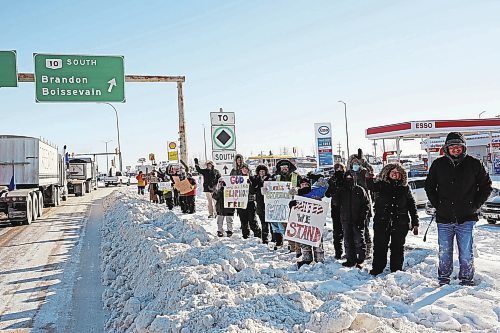 Brandon Sun 25012022

Hundreds of westman residents braved the bitter cold in support of the 'Freedom Rally'  convoy as it made its way through Brandon on the Trans Canada Highway on Tuesday demonstrating opposition to vaccine mandates. The convoy of at least hundreds of vehicles took over an hour to make its way through Brandon. (Tim Smith/The Brandon Sun)