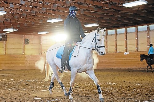 27012022
A rider trains with Goldie, a Hanoverian Cross,  at Phoenix Ranch Boarding Stables &amp; Equestrian Centre south of Brandon on Thursday for this weekends Behlen Industries LP Icicle Schooling Show, presented by Westman Dressage. (Tim Smith/The Brandon Sun)
***Rider didn't want his name used*** 