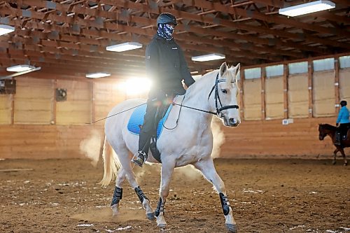 A rider trains with Goldie, a Hanoverian Cross, at Phoenix Ranch Boarding Stables and Equestrian Centre, south of Brandon, Thursday, for this weekend's Behlen Industries LP Icicle Schooling Show, presented by Westman Dressage. (Tim Smith/The Brandon Sun)