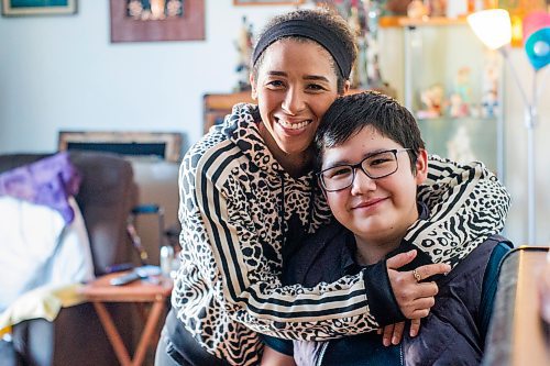 MIKAELA MACKENZIE / WINNIPEG FREE PRESS

Desiree Scott and her 11-year-old brother, DeeJay Sinclair, pose for a portrait in their home in Winnipeg on Thursday, Jan. 27, 2022.  For Mike Sawatzky story.
Winnipeg Free Press 2022.