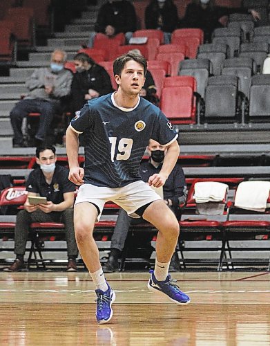 Brandon University Bobcats libero Liam Nohr prepares to dig during a five-set win over the host Winnipeg Wesmen at the Duckworth Centre on Thursday. The teams play again tonight in Brandon. (Thomas Friesen/The Brandon Sun)