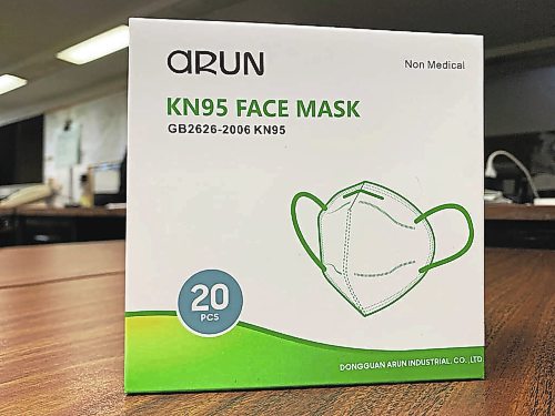 Brandon Sun Boxes of KN95 respirator masks like these are now available at Liquor Marts in Brandon. Each person is allowed to take one box for free as long as supplies last. (Matt Goerzen/The Brandon Sun)