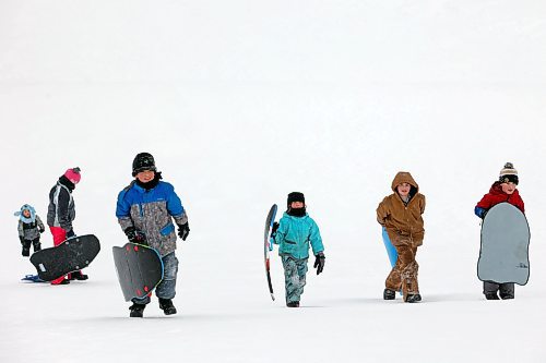 A group of home-school students from a few families sled together at Hanbury Hill in Brandon on a mild Monday afternoon. (Tim Smith/The Brandon Sun)
