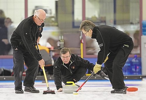 Carl German throws a rock during his match against Brent Strachan's rink in the opening draw of the 2011 Neil Andrews Legends Classic bonspiel at the Brandon Curling Club. German's 2002 Canadian senior championship rink earned a spot in the Manitoba Curling Hall of Fame Tuesday. (Tim Smith/Brandon Sun)