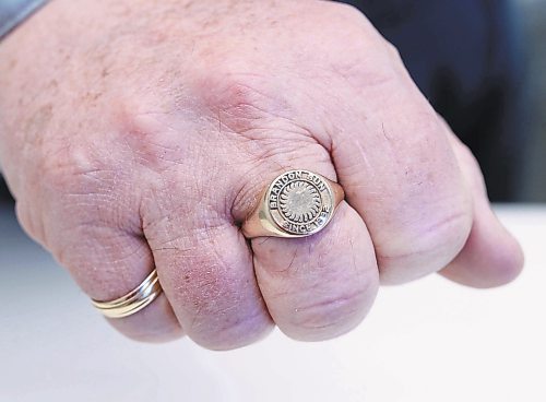 Goldstone, a former employee of 26 years for the Brandon Sun shows off his gold ring he received from the company many years ago. (Joseph Bernacki/The Brandon Sun)