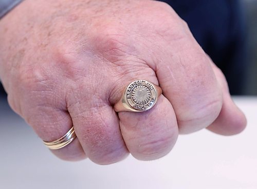 Vince Goldstone, a former employee of 26 years for The Brandon Sun, shows off his gold ring he received from the company many years ago. (Joseph Bernacki/The Brandon Sun)