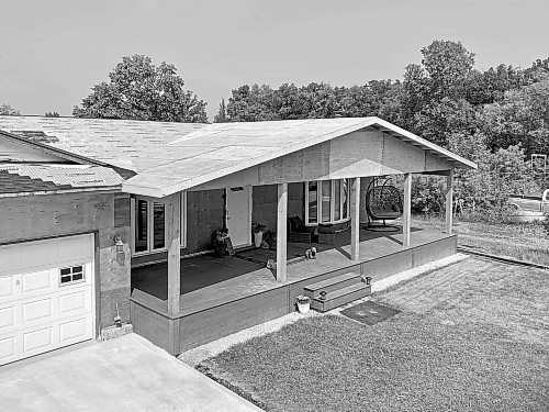 Marc LaBossiere / Winnipeg Free Press
An engineered porch and new roofline is built from architectural drawings based on the custom design.