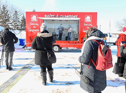 RUTH BONNEVILLE / WINNIPEG FREE PRESS

 LOCAL / ENT - FdV

Musicians play inside the music box during the launch of the 2022 festival on Thursday. 

The Festival du Voyageur unveils its Music Box, the Boite de chansons at Whittier Park. At the festival kickoff presser, musicians played inside the music box, which is a trailer that has a band inside separated by glass, to perform for the audience outside. It's partially a COVID-19 protection shield, but also helps when it's cold because band can have electronic difficulty in cold weather. 

See Small story. 

Feb 17th, 2022