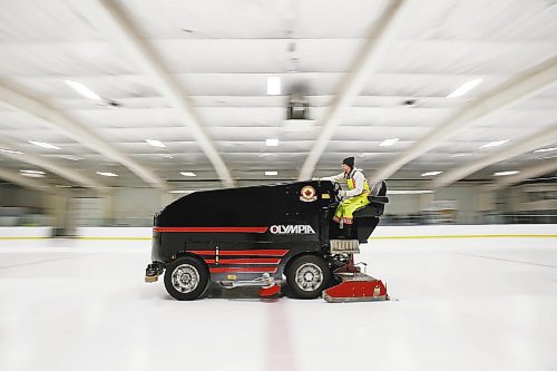 JOHN WOODS / WINNIPEG FREE PRESS

Taylor Brandt, recreation facility operator at East St Paul Community Centre, resurfaces the indoor rink at the community centre Monday, February 14, 2022. Brandt has been driving an ice resurfacer for the past year. Brandt also does landscaping at the centre during the summer months.



Re: Small