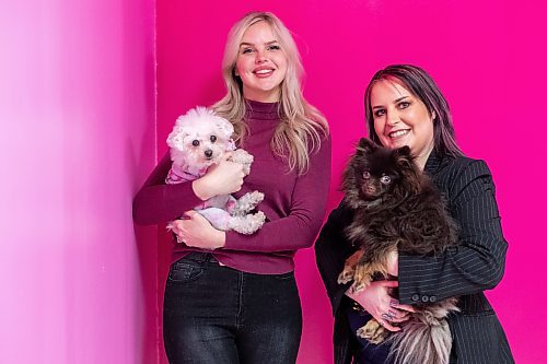 Daniel Crump / Winnipeg Free Press. Carly Reimer and Nikki Carruthers, co-owners of Neon Dragon, with their dogs Peep and Viper. Neon Dragon is a luxury pet studio opening this spring. February 23, 2022.