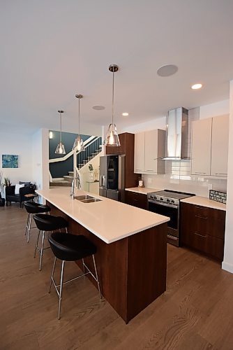 Todd Lewys / Winnipeg Free Press
Anchored by a 10-foot island, the kitchen is a striking yet highly functional space.