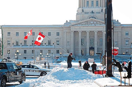 MIKE DEAL / WINNIPEG FREE PRESS

Protestors pack up and move their vehicles away from the Memorial Boulevard location across from the Manitoba Legislative building Wednesday morning. Some of the protestors have been moving gear over to Memorial Park where they plan on setting up tents, a stage and a large tipi.

220223 - Wednesday, February 23, 2022.