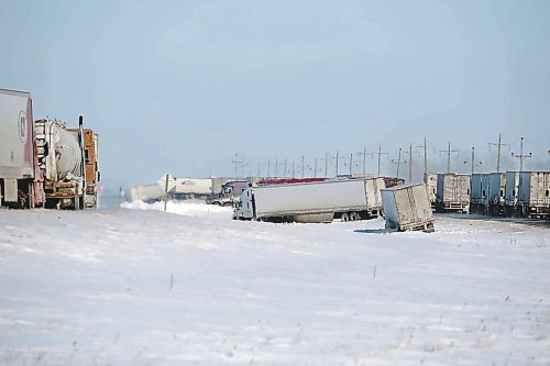 Brandon Sun 24022022

Semi trailers rest in the median between the westbound and eastbound lanes of the Trans Canada Highway east of Griswold, Manitoba as other backed up vehicles wait to pass the scene of a major collision involving approximately two dozens vehicles on the highway on Thursday. The extremely icy conditions caused several vehicles to go off the road on the Trans Canada Highway around Griswold in addition to the several vehicle collision. (Tim Smith/The Brandon Sun)