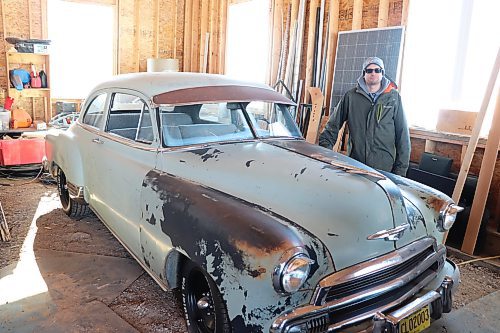 Tim Nickel poses for a photo with his 1951 Chevrolet Styleline Special on Thursday morning in the Cottonwoods area. The 38-year-old electrical instructor has been working on classic cars since he was a teenager and still finds time for his hobby when he's not teaching at Assiniboine Community College. (Kyle Darbyson/The Brandon Sun)