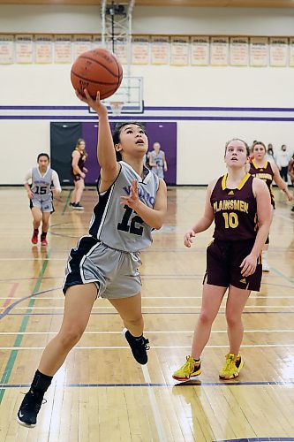 Annie Tan of the Vincent Massey Vikings shoots during Game 1 of the best-of-three varsity girls basketball city final against the Crocus Plainsmen at Vincent Massey on Thursday evening. (Tim Smith/The Brandon Sun)
