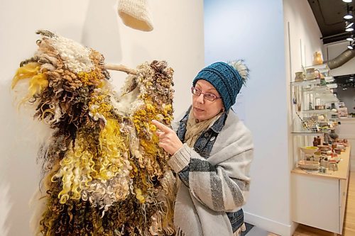 Maureen Winnicki Lyons used a number of different wools to make up her intricate top. (Photos by Mike Sudoma/Winnipeg Free Press)