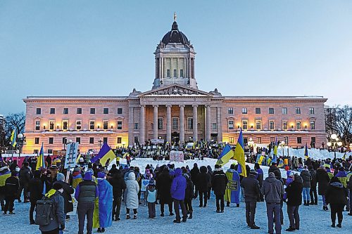 Daniel Crump / Winnipeg Free Press. Thousands gathered at the Manitoba legislature in Winnipeg Saturday evening to show their support for Ukraine. February 26, 2022.