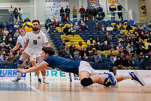 Brandon University Bobcats Liam Nohr digs a University of Manitoba Bisons attack in their Canada West men's volleyball match at the Healthy Living Centre Saturday. (Chelsea Kemp/The Brandon Sun)