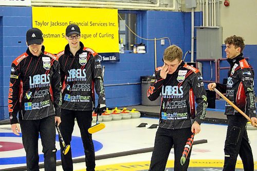 Jordon McDonald wipes a tear from his eye after he and his Deer Lodge rink won the Manitoba junior men's curling championship Sunday. (Lucas Punkari/The Brandon Sun)