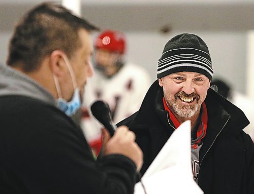 GCB Wildcats head coach Corey Forbes chuckles as Ryan Diehl makes a joke during a pre-game ceremony marking Forbes&#x2019; 800th game behind the bench with the Westman High School Hockey League team on Saturday at Glenboro Arena. (Perry Bergson/The Brandon Sun)
Feb. 26, 2022