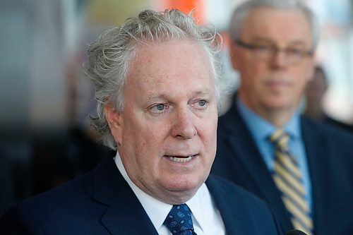 Former Quebec Premier Jean Charest was named Rail Relocation Task Force Chair at a news conference Thursday at The Forks. At right is Premier Greg Selinger.Mary Agnes story Wayne Glowacki / Winnipeg Free Press Jan. 14 2016