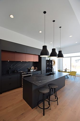 Todd Lewys / Winnipeg Free Press

Filled with fabulous finishes, the roomy island kitchen in this Sage Creek split-level is a stunning yet highly functional space.