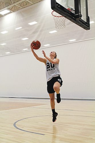 Reetta Tulkki does a reverse layup during Brandon University Bobcats women's basketball practice at the Healthy Living Centre on Monday. (Thomas Friesen/The Brandon Sun)