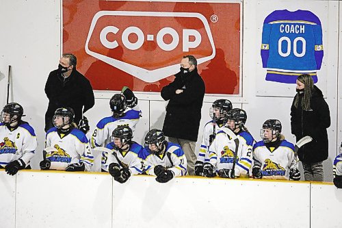 Brandon Sun Westman Wildcats head coach Guy Williams watches on as his team takes on the Yellowhead Chiefs in Hartney on Dec. 21. (Lucas Punkari/The Brandon Sun)