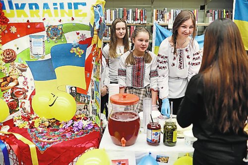 Brandon Sun 20032018

Students representing Ukraine serve traditional dishes during Heritage Days 2018 at Vincent Massey High School on Tuesday.  (Tim Smith/The Brandon Sun)