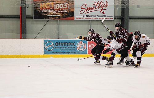 JESSICA LEE / WINNIPEG FREE PRESS



Players race for the puck during a game with the Westwood Warriors and St. Paul&#x2019;s Crusaders on March 3, 2022.



Reporter: Mike S.