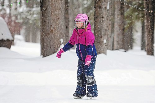 Brandon Sun 04032022

Eight-year-old Rhea Majcher of Winnipeg skates on the rink in Wasagaming with family on a snowy Friday afternoon.   (Tim Smith/The Brandon Sun)